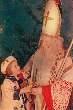 St Nicholas in white with child