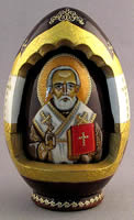 Wood egg with opening showing inner egg with icon image