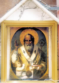 Bari, Italy, icon of St Nicholas with children, house shrine