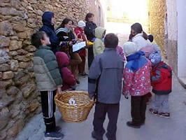 Group singing with wicker basket