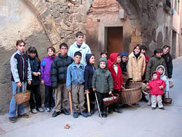 Children with wooden swords & basket