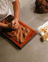 Pressing dough into mold