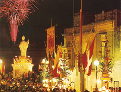 Fireworks above St Nicholas statue in the square