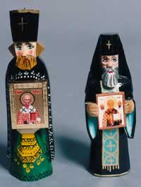 Handcarved Orthodox priests with St Nicholas icons