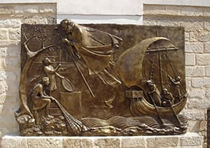 St Nicholas leading the boat to shore